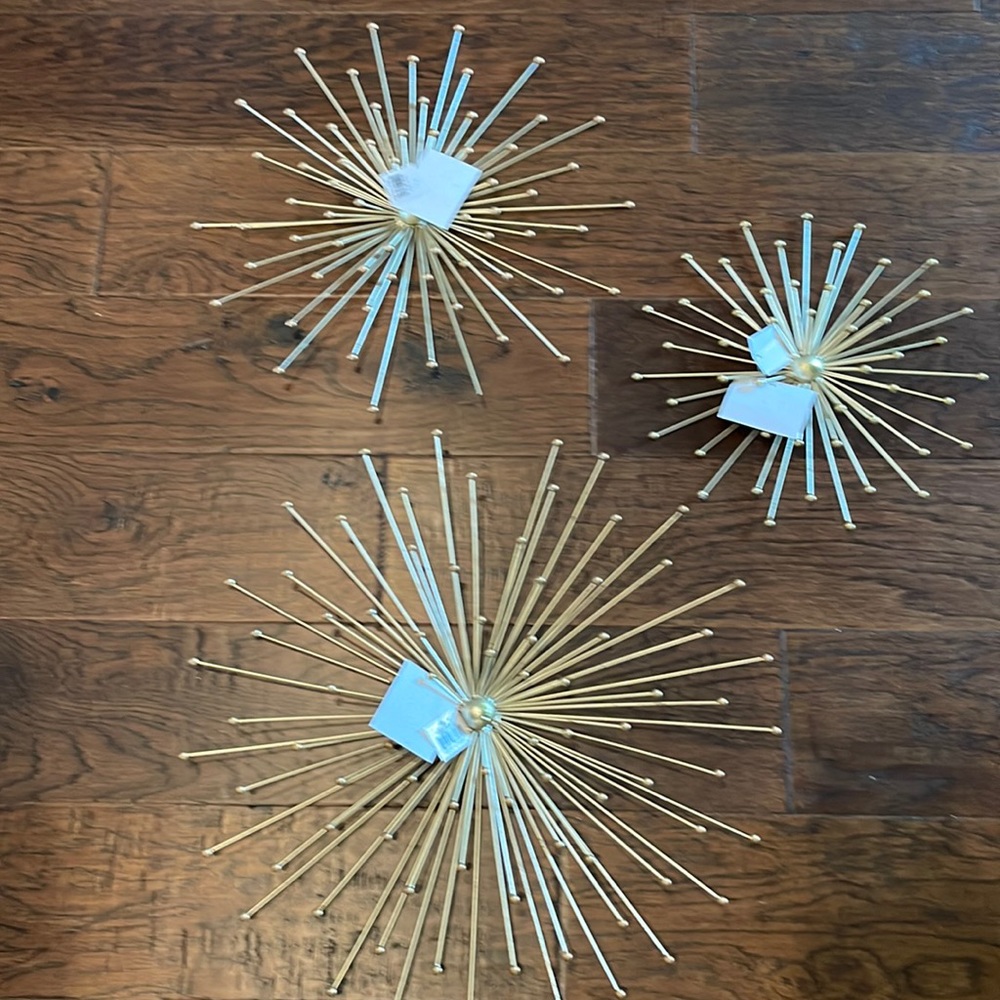 Star like gold wall hanging decor